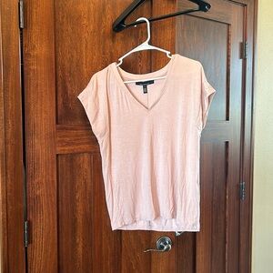 White House Black Market pink relaxed v neck top. Size small.